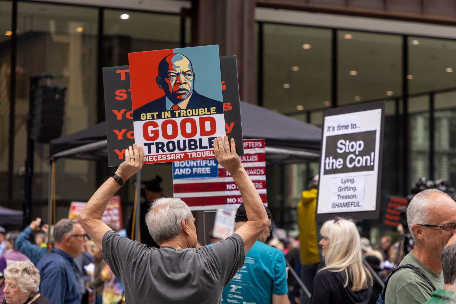 'Good Trouble' Protesters Honor John Lewis’ Legacy And Vow To Stand Up Against Trump