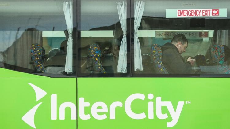New Zealand woman arrested after 2-year-old girl found alive in suitcase stowed in bus luggage