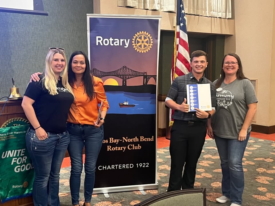 Congratulations and welcome to our newest members: Jennifer Armstrong is the owner of our local McDonalds including the two in the bay area.  Seth Stroud is the Business Development Representative with Amerititle in Coos Bay. Jennifer, wanting to become more involved in our community, saw Rotary and its projects as that pathway. Seth is known for his involvement in the community, helping to raise funds for the Star of Hope through Dancing with the stars, working on the Rotary Battery Box Project, and helping businesses as a member of the Bay Area Chamber of Commerce Ambassadors. They are seen here with their sponsors (L to R: Mariss Stevens, Jennifer Armstrong, Seth Stroud, and Lonni Corona)