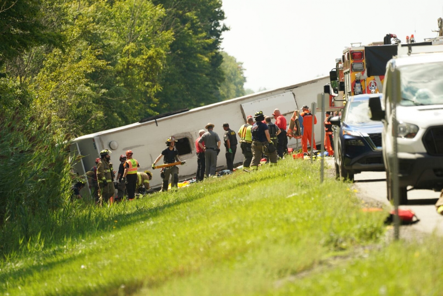 Tour bus rollover kills 5 on interstate highway in western New York