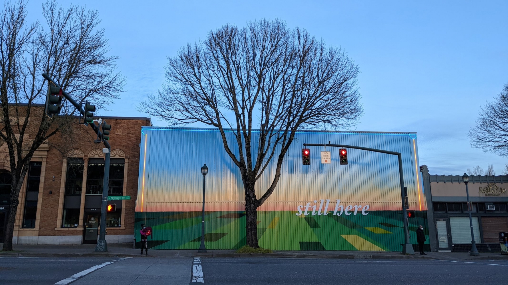 After a torrent of graffiti and a provocative sign, what remains of this NE Portland mural?