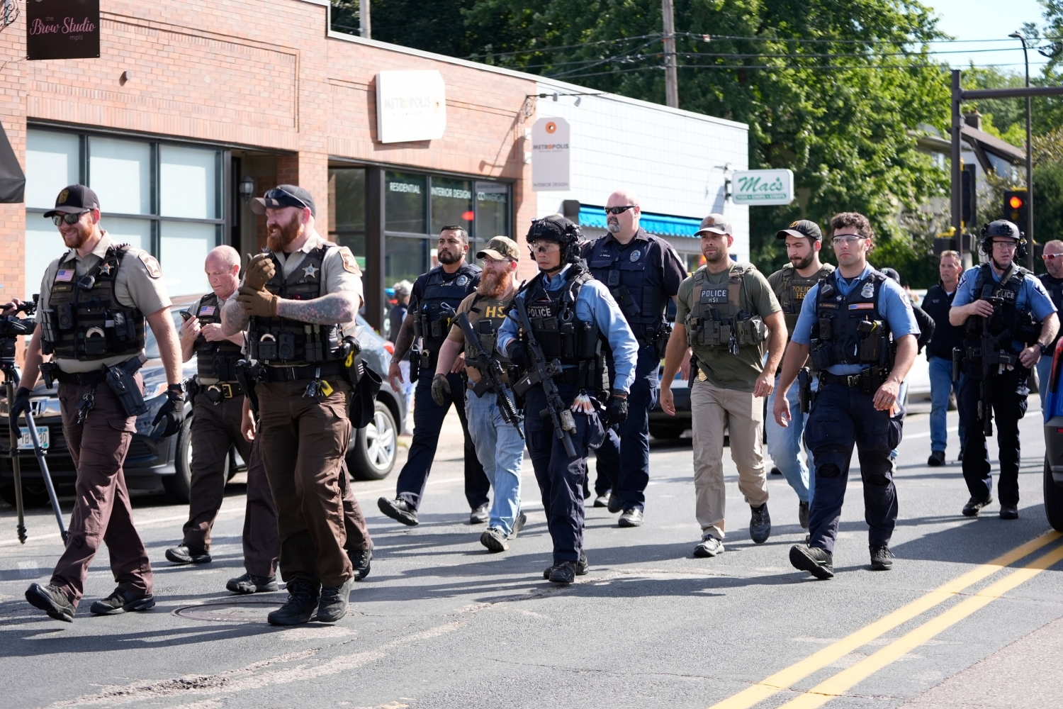 Minneapolis police: shooting at Catholic school has left 3 dead, including shooter, and 17 injured