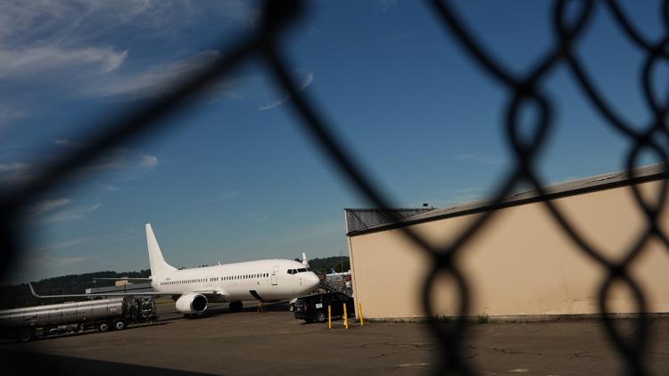 US deportation flights hit record highs as carriers try to hide the planes, advocates say