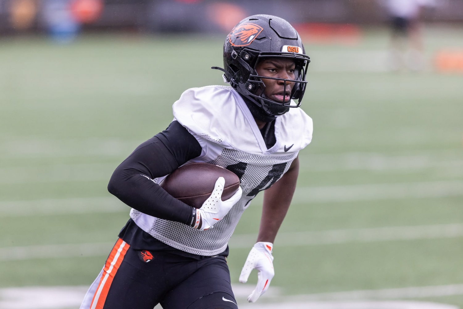 Whether in an Ugandan orphanage or the end zone, Eddie Freauff's joy persists