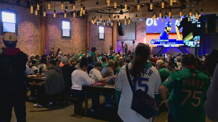 Mariners fans celebrate ALCS Game 2 win during watch party at Victory Hall