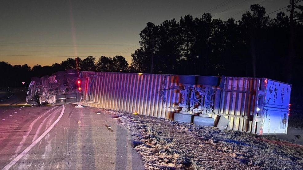 PHOTOS: 18-wheeler flips over in accident on Fall Line Freeway in Washington County