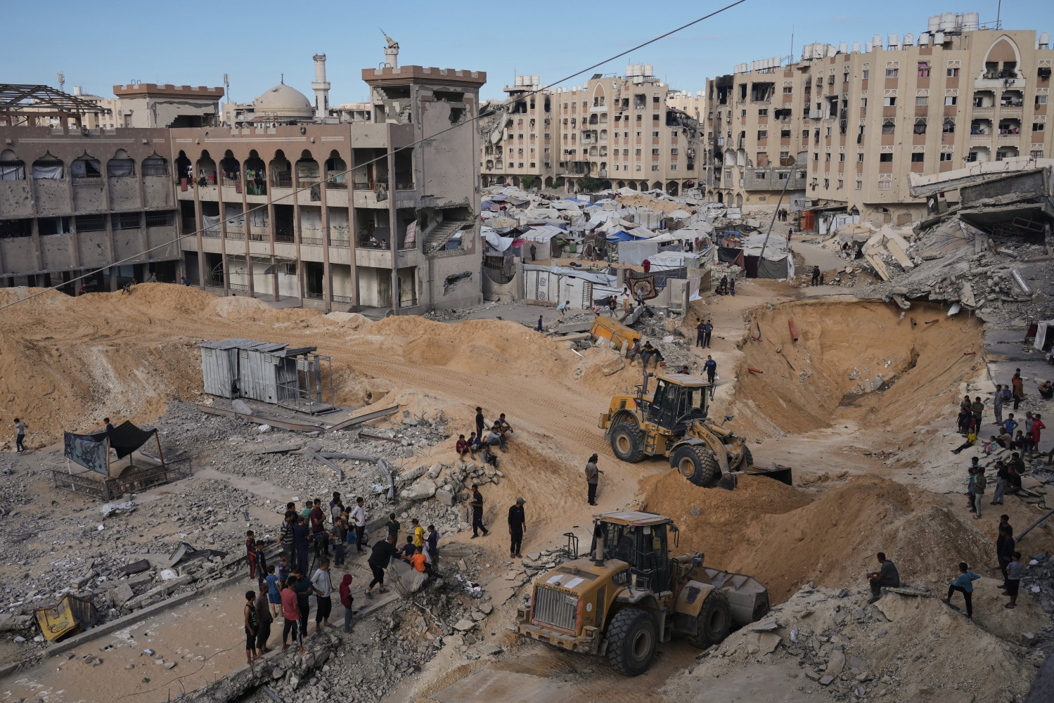 Israel says Hamas hands over ‘2 coffins of deceased hostages’ to the Red Cross in Gaza